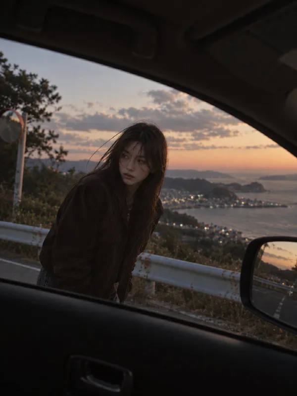 Coastal Road Through a Car Window