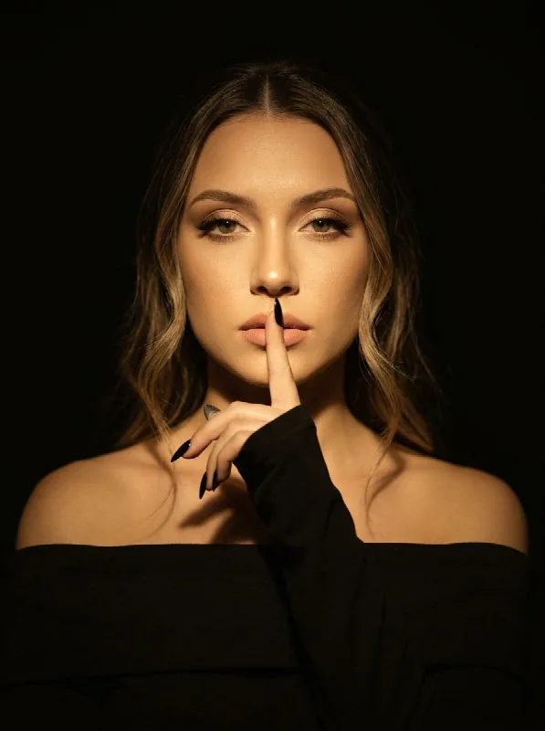 Finger to Lips