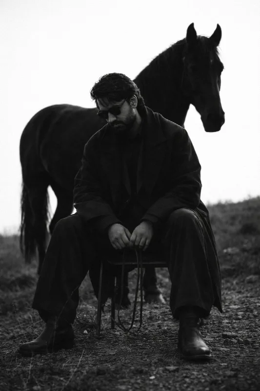 Cinematic Black and White Man and Horse Portrait