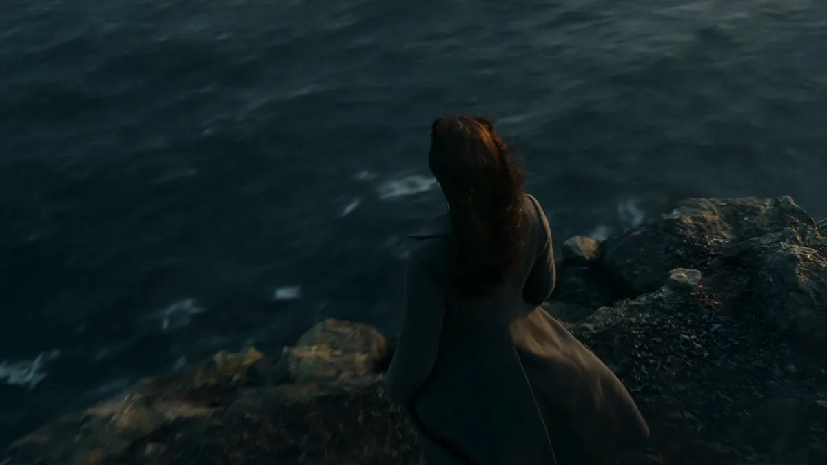 Woman on a Stormy Cliff