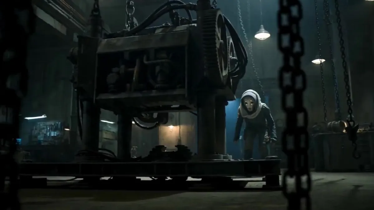 Masked Figure in Dark Workshop